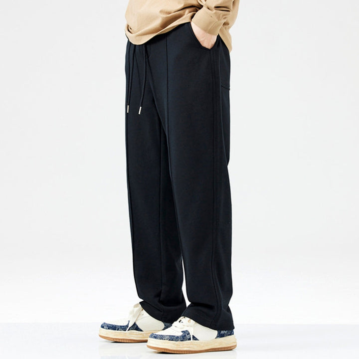 Schwarze Jogginghose Herren, bequem, Baumwolle, Freizeitmode, mit Kordelzug, sportlich.
