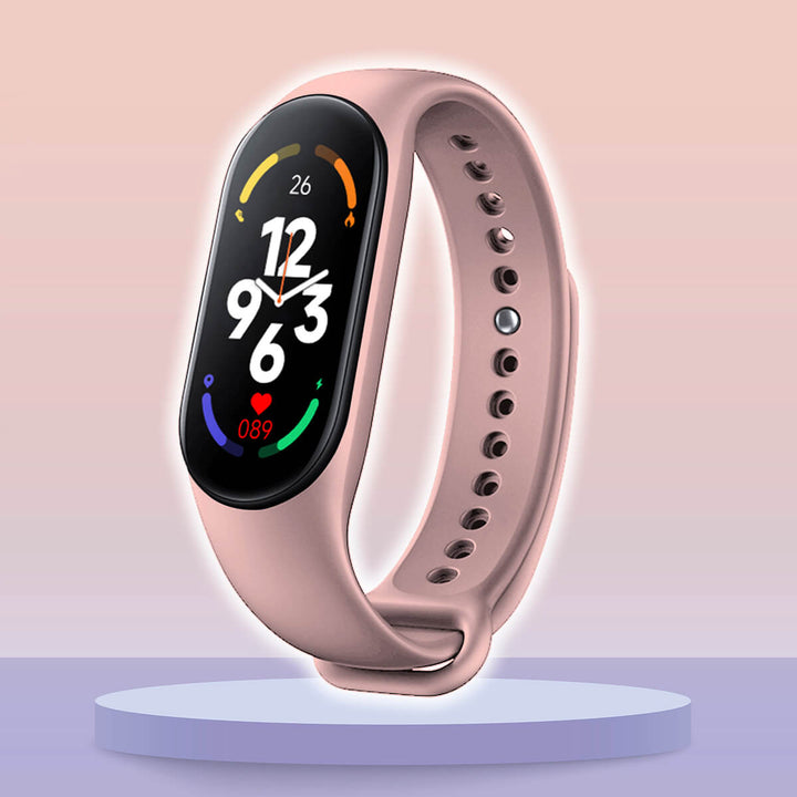 Pfirsichfarbenes Fitbit-Smartwatch mit rundem Display, Fitness-Tracker, Herzfrequenzmesser.