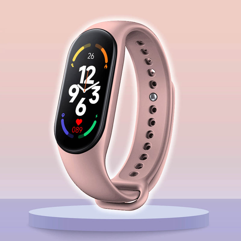 Pfirsichfarbenes Fitbit-Smartwatch mit rundem Display, Fitness-Tracker, Herzfrequenzmesser.