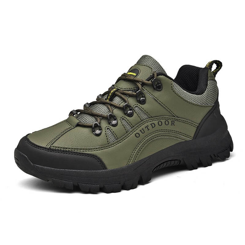 Grüner Outdoor-Wanderschuh, rutschfeste Sohle, robustes Design, ideal für Trekking.