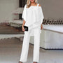 Elegantes weißes Damen-Outfit, zweiteilig, schulterfrei, ideal für Sommermode und Abendveranstaltungen.