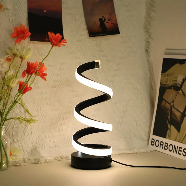 Moderne LED-Tischlampe in Spiralform, schwarz-weiß, dekorativ, energiesparend, für Wohnzimmer.