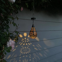 Solarbetriebene Gartenlaterne, tropfenförmig, schwarzes Metall, Blumenmuster, stimmungsvolle Beleuchtung