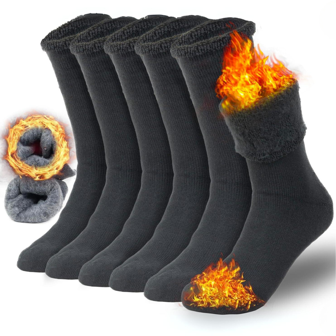 Sechs Paar schwarze Thermosocken, flauschig, warm, ideal für kalte Wintertage.