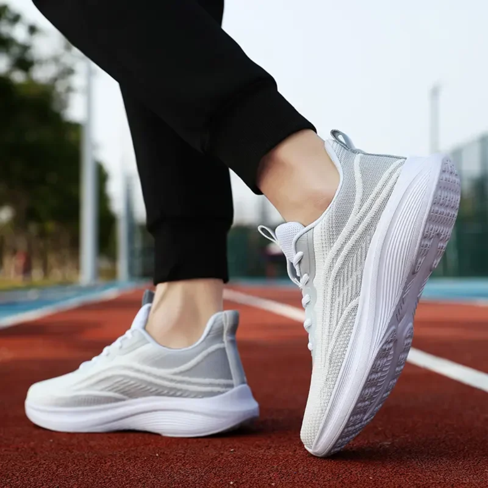 Graue Sportschuhe für Damen, atmungsaktiv, leicht, ideal zum Laufen und Fitness.