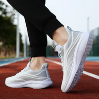 Graue Sportschuhe für Damen, atmungsaktiv, leicht, ideal zum Laufen und Fitness.