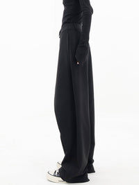 Schwarze asymmetrische Baggy-Hose für Damen, lässig, modisch, bequem, aus Baumwolle.