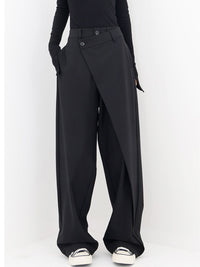 Schwarze asymmetrische Baggy-Hose für Damen, modisch, elegant, mit weitem Bein.