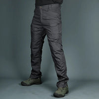 Graue taktische Hose für Herren, robust, mit Taschen, ideal für Outdoor-Aktivitäten.
