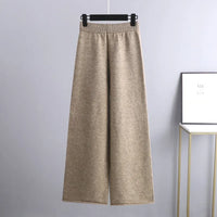 Beige Damenhose aus Wolle, weite Passform, elegant, bequem, modisch, Herbst-Winter-Kollektion.