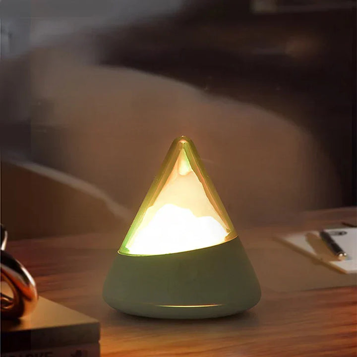Grüne LED-Nachttischlampe in Bergform, stimmungsvolles Licht, modernes Design.