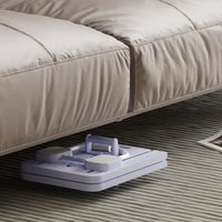 Lila Möbelheber unter Sofa, Teppichboden, Möbeltransport, Hebewerkzeug, Heimwerkerbedarf.