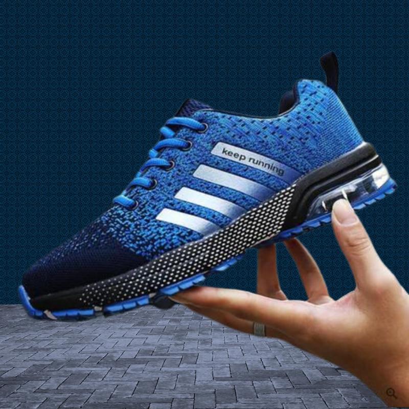 Blaue Laufschuhe mit weißen Streifen, atmungsaktiv, sportlich, für Herren, auf grauem Boden.