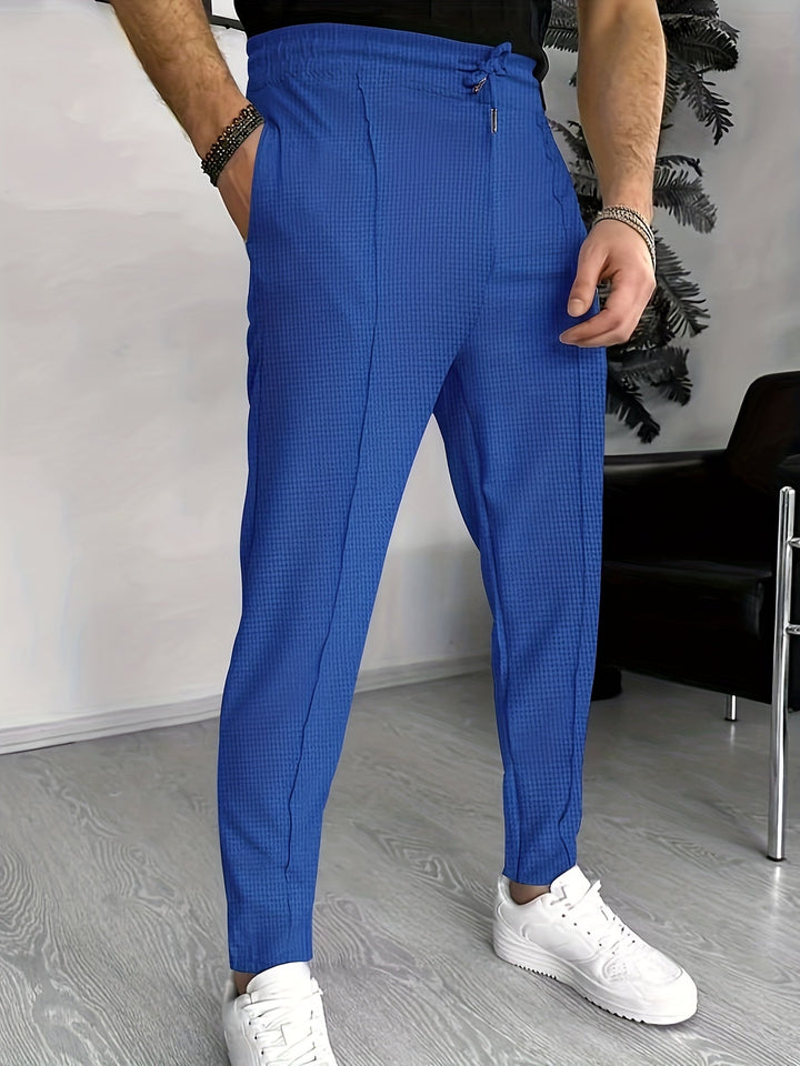 Blaue Herren-Chinohose, kariert, modern, aus Baumwolle, ideal für Freizeit und Büro.