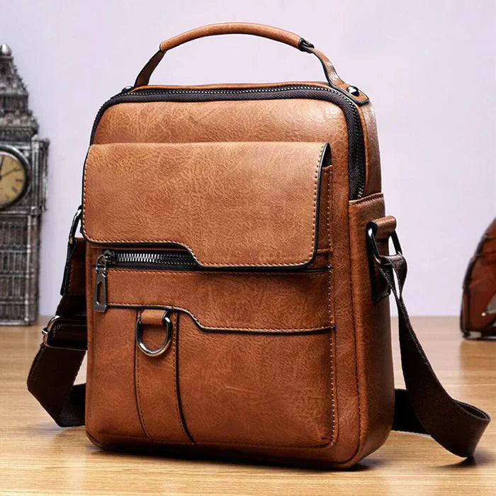 Braune Ledertasche, modern, stilvoll, Schultertasche, Herren, Reißverschluss, verstellbarer Gurt.