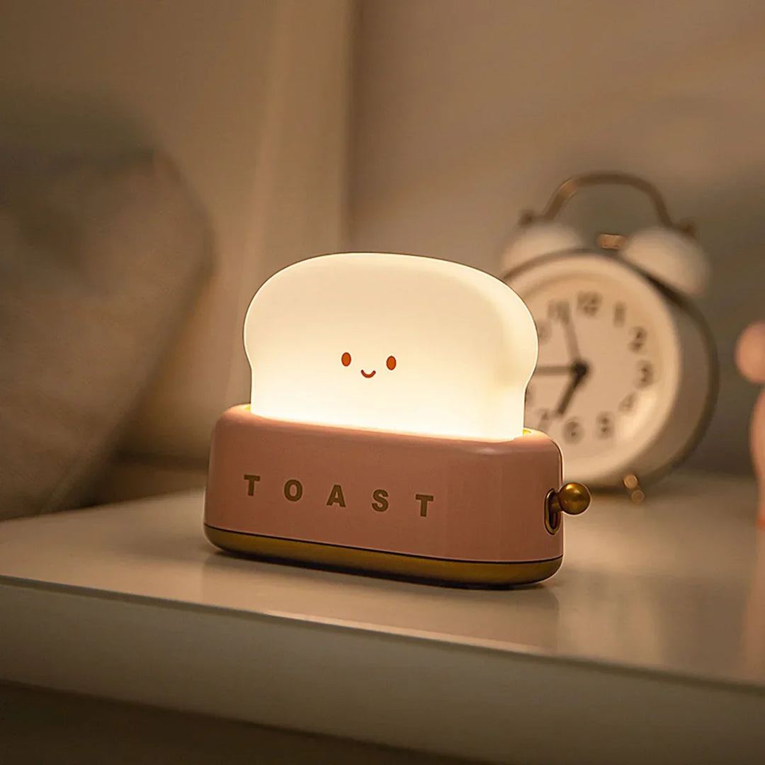 Nachtlicht in Toastform, LED, warmweiß, Kinderzimmer, dekorativ, USB-aufladbar, rosa.