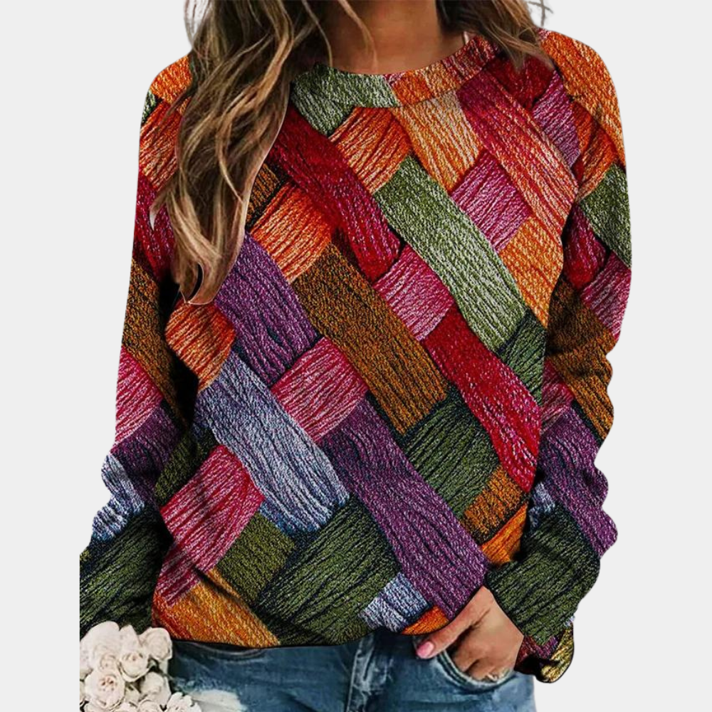 Frau in buntem Strickpullover, Zopfmuster, Herbstmode, lässig, Damenbekleidung, orange.