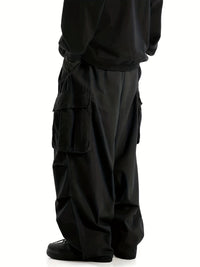 Schwarze Cargo-Hose Herren, weites Bein, Taschen, Streetwear, modisch, lässig, Baumwolle.