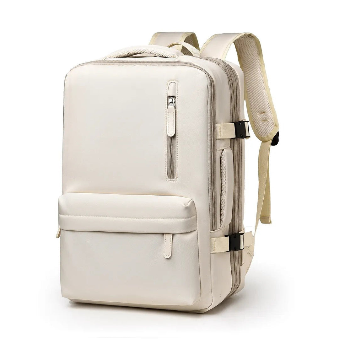 Beiger Rucksack aus Leder mit Reißverschlusstaschen, ideal für Reisen und Alltag.