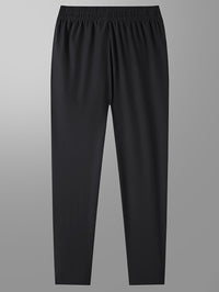 Schwarze Jogginghose, elastischer Bund, atmungsaktives Material, Sportbekleidung für Herren.