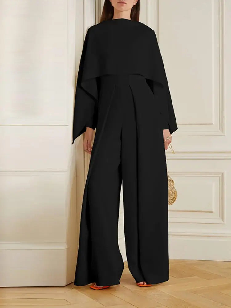Eleganter schwarzer Damen-Jumpsuit mit weitem Bein und Reißverschluss, langärmlig, Frühling 2024.