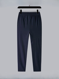 Dunkelblaue Jogginghose aus Baumwolle, elastischer Bund, bequeme Sportbekleidung für Herren.
