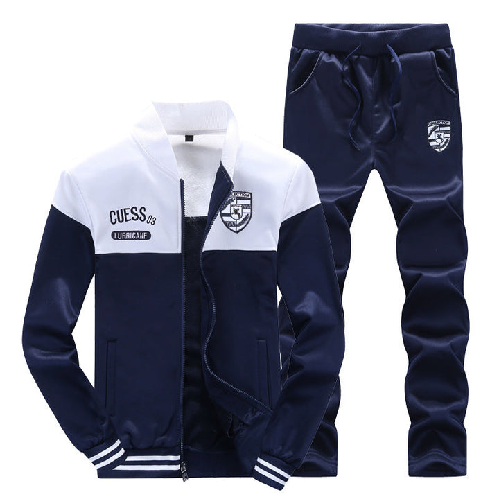 Dunkelblauer Herren-Trainingsanzug, zweifarbig, mit Reißverschluss und Logo, sportlich, bequem.
