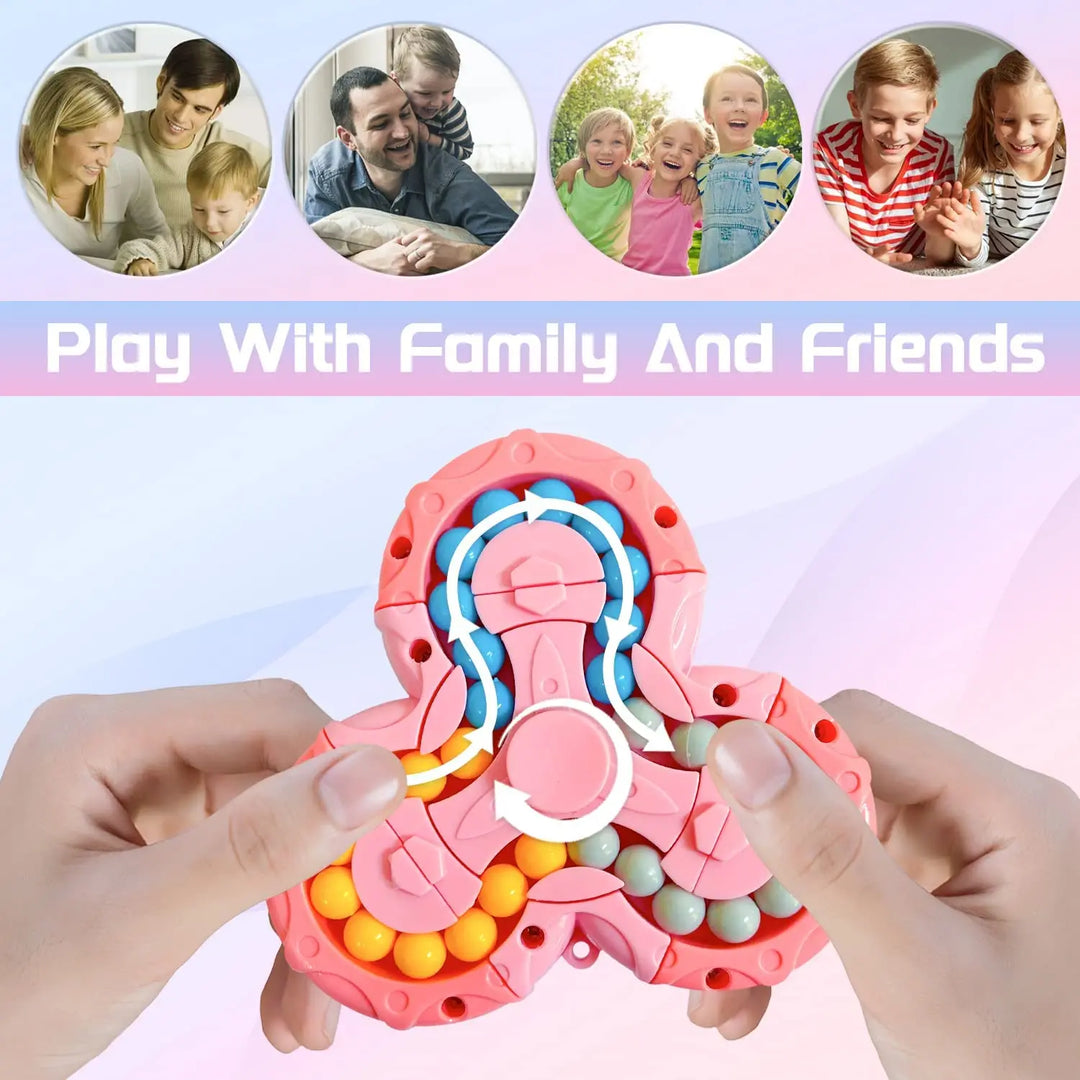 Rosa Fidget Spinner mit bunten Kugeln, ideal für Stressabbau und Spielspaß mit Familie.
