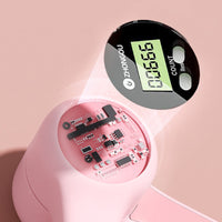 Rosa elektronischer Zähler mit digitalem Display, Kunststoffgehäuse, moderne Technologie.