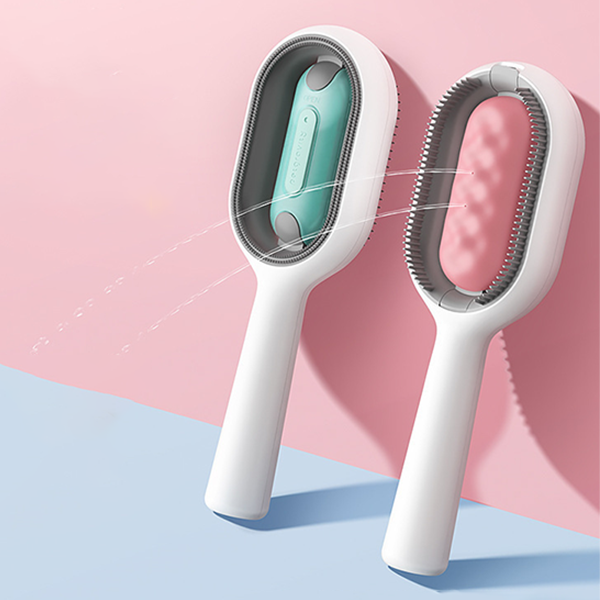 Weiße Haustierfellbürste mit ergonomischem Griff, doppelseitiges Design, rosa Hintergrund.