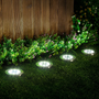 Solarbetriebene LED-Bodenleuchten im Garten, Edelstahl, energiesparend, wetterfest.