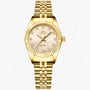 Goldene Damenarmbanduhr mit Strasssteinen, Quarzwerk, elegantes Design, Metallarmband.