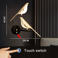Goldene Vogel-Wandleuchte mit Touch-Schalter, modernes Design, 39cm hoch, 29cm breit.