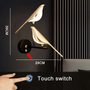 Goldene Vogel-Wandleuchte mit Touch-Schalter, modernes Design, 39cm hoch, 29cm breit.