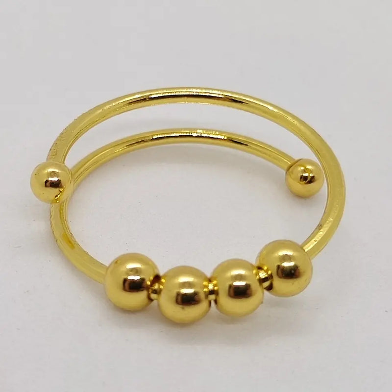 Goldener Nasenring mit Kugeln, Piercingschmuck, Edelstahl, modisch, glänzend, Unisex-Accessoire.