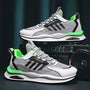 Graue und grüne Herren-Sneaker, atmungsaktiv, Mesh, sportlich, modisch, Herbst.