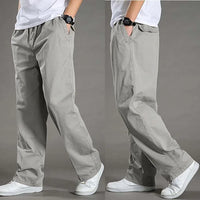 Graue Herren-Chinohose, locker geschnitten, Baumwolle, lässiger Stil, ideal für Freizeitkleidung.