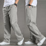 Graue Herren-Chinohose, locker geschnitten, Baumwolle, lässiger Stil, ideal für Freizeitkleidung.