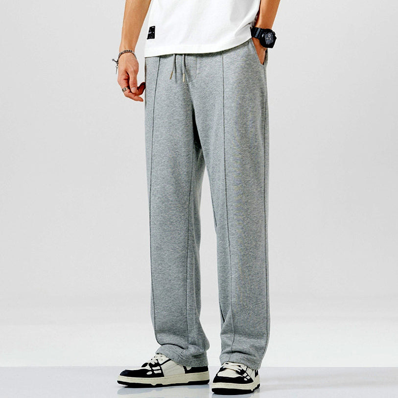 Graue Jogginghose Herren, bequem, Baumwolle, sportlich, lässig, mit Kordelzug, modisch.