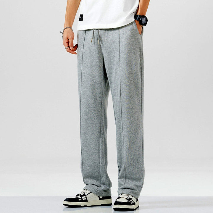 Graue Jogginghose Herren, bequem, Baumwolle, sportlich, lässig, mit Kordelzug, modisch.