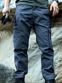 Graue taktische Cargohose für Herren, robustes Material, ideal für Outdoor-Aktivitäten.