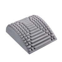 Graues ergonomisches Keilkissen aus Schaumstoff für Rückenunterstützung und Haltungskorrektur.
