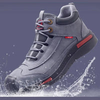 Grauer wasserdichter Sicherheitsschuh, rutschfest, robust, ideal für Arbeit und Outdoor.