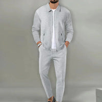 Grauer Herren-Trainingsanzug, Reißverschlussjacke, Jogginghose, Freizeitmode, Sportbekleidung.