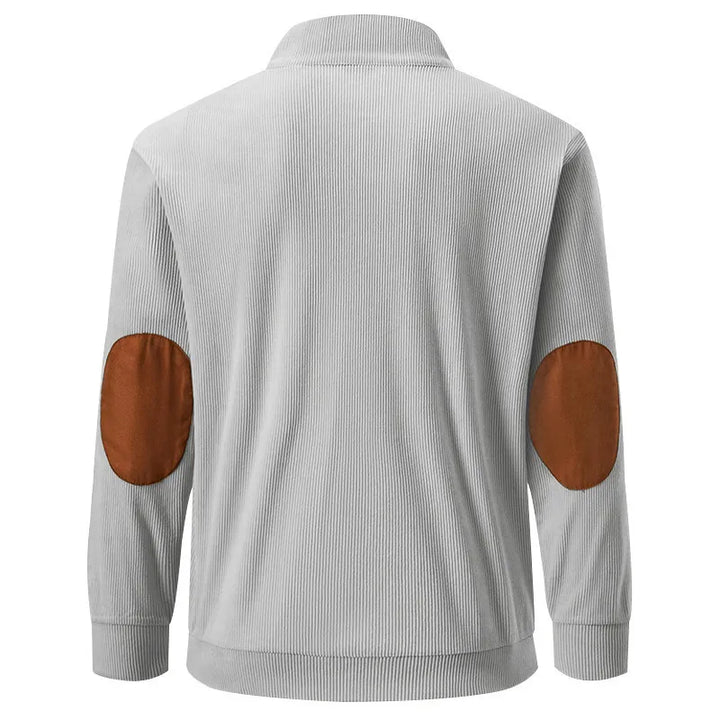 Grauer Cord-Pullover mit braunen Ellbogen-Patches, Herrenmode, stilvoll und bequem.