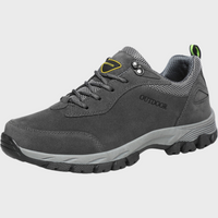 Grauer Outdoor-Wanderschuh, Herren, rutschfeste Sohle, atmungsaktiv, robustes Design.