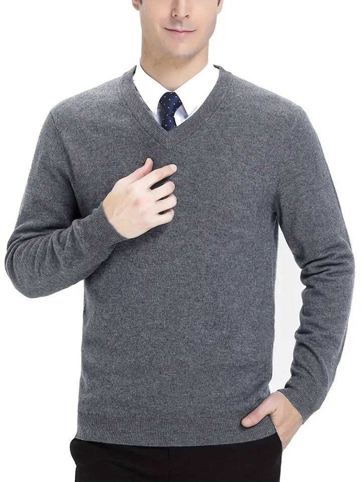 Grauer Herrenpullover aus Kaschmir, V-Ausschnitt, elegant, warm, ideal für Büro und Freizeit.