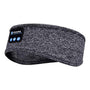 Dunkelgraues Bluetooth-Stirnband mit Bedienelementen, ideal für Sport und Musik.