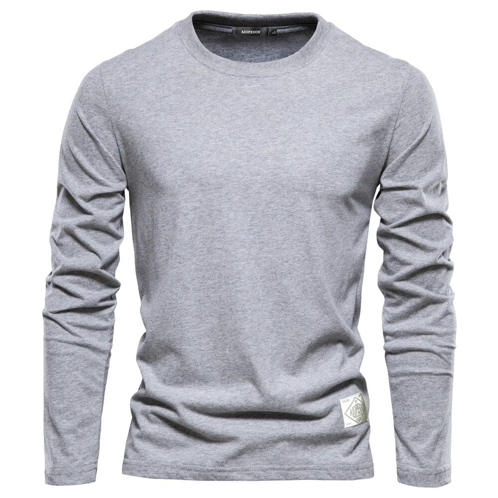 Graues Langarmshirt aus Baumwolle für Herren, klassisches Design, bequem und stilvoll.