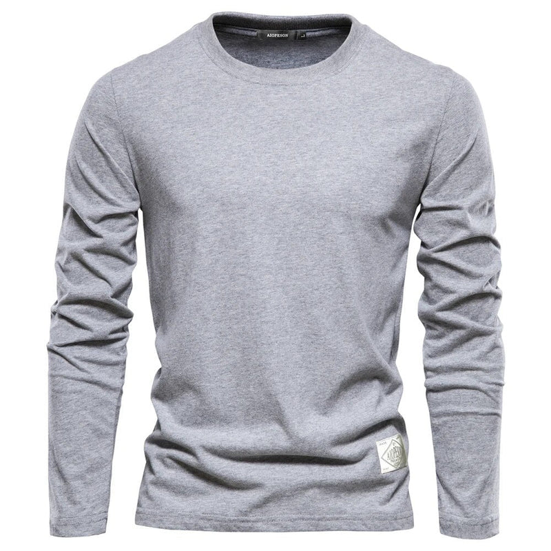 Graues Langarmshirt aus Baumwolle für Herren, klassisches Design, bequem und stilvoll.